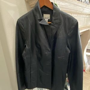Black vintage leather jacket in great shape. Size large by East 5th